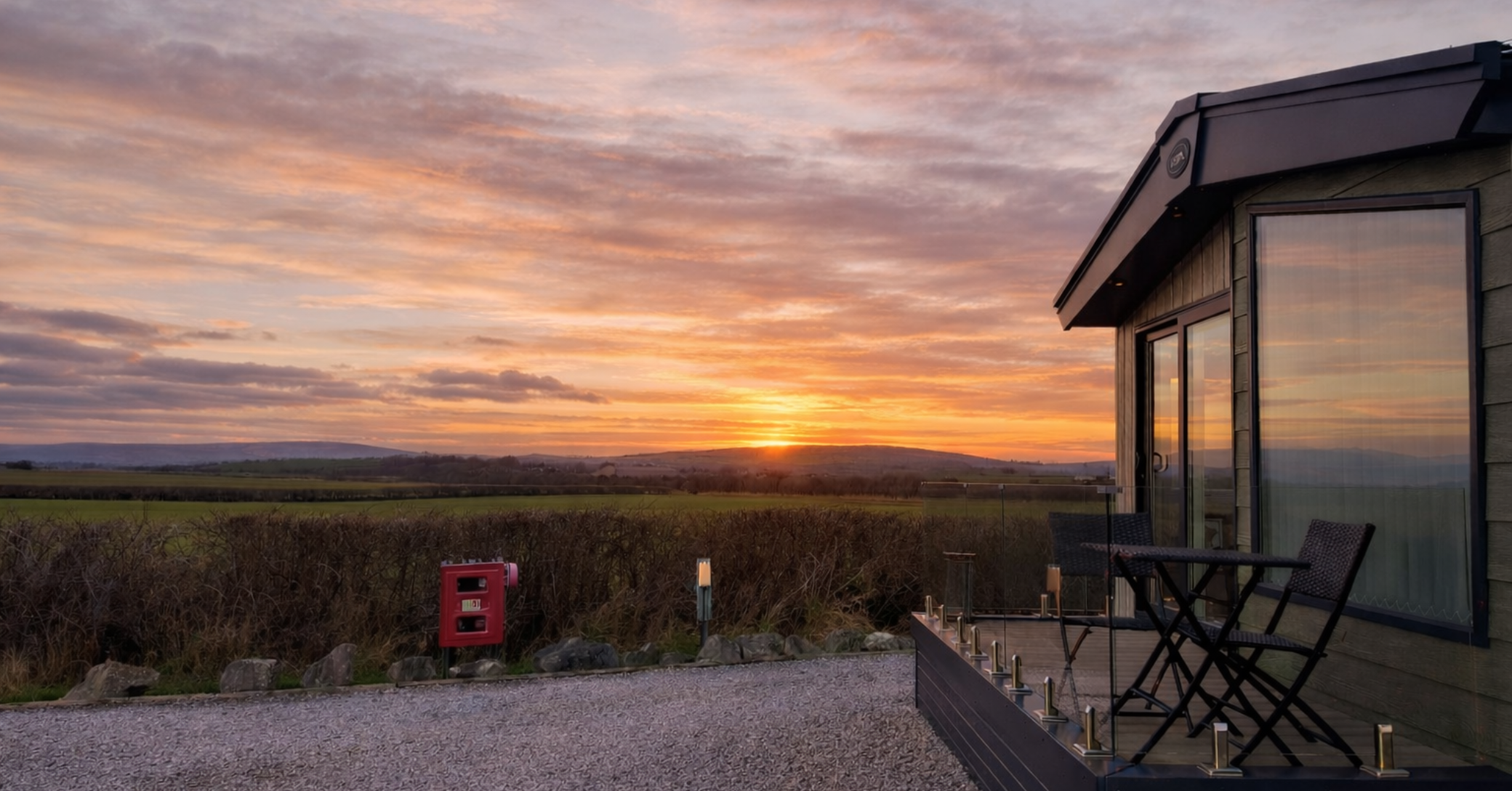 Greendales Farm Lodge in sunset